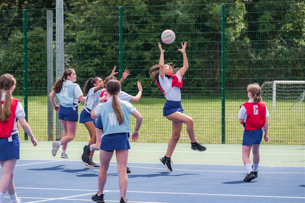 Photo of students playing netball 