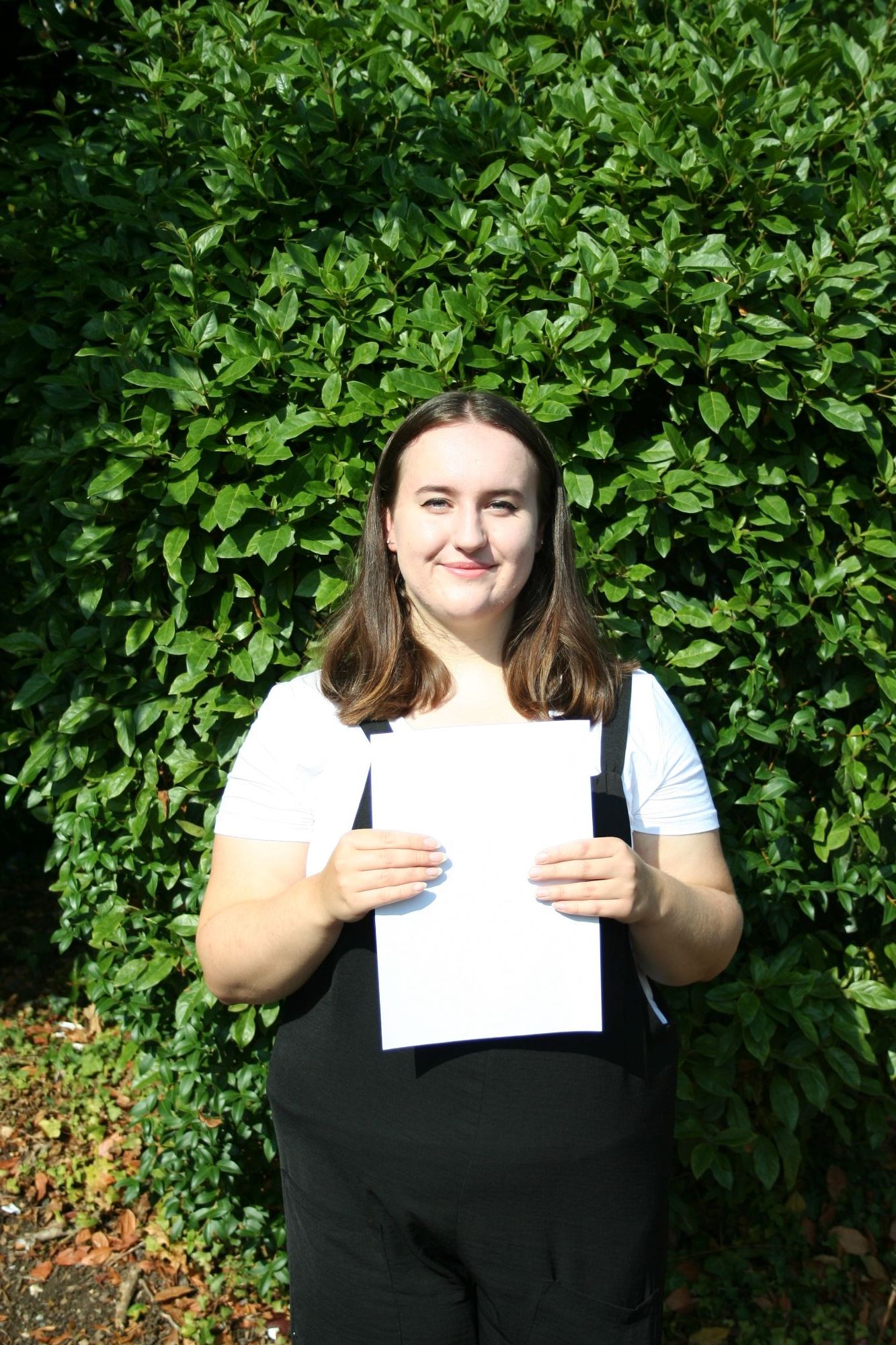​​​​Photo of Student receiving A Level Results 