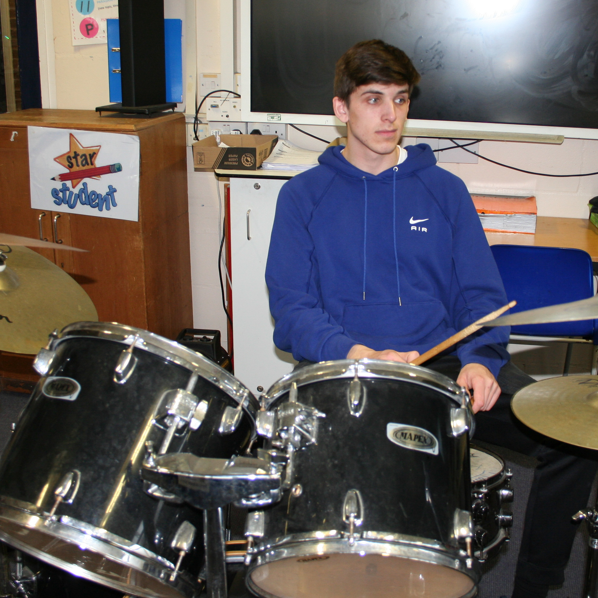 Year 13 A Level Student playing drums