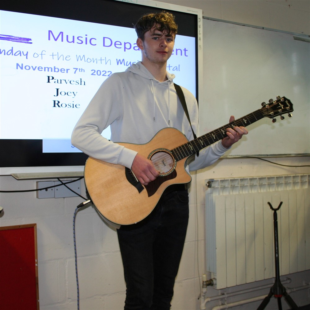 Photo of Year 12 Student on Guitar