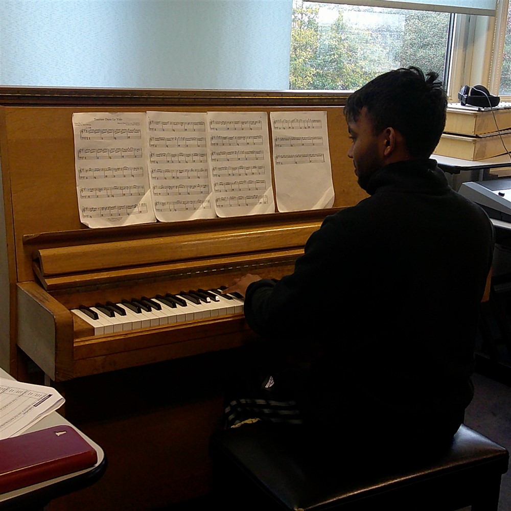 Photo of Year 12 Student on Piano 